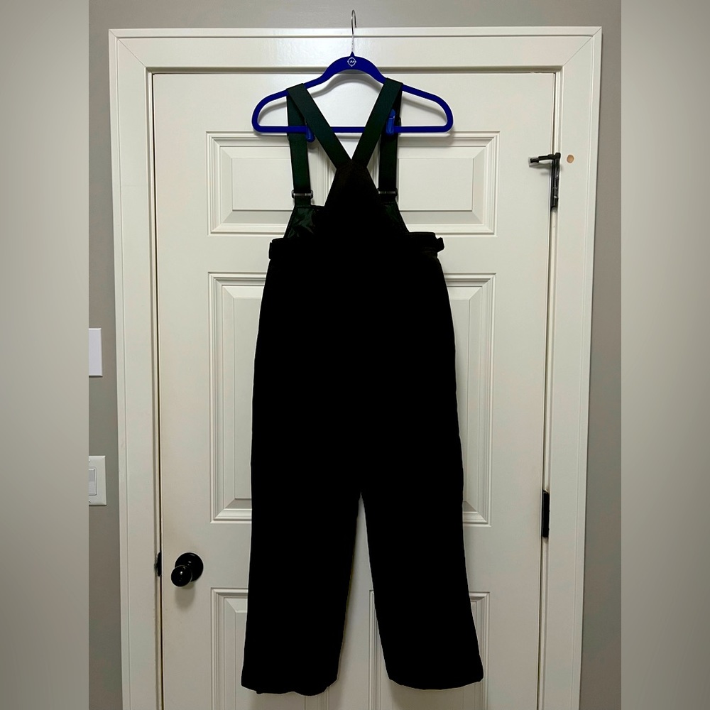 Girls XL snow bibs by Boulder Wear.